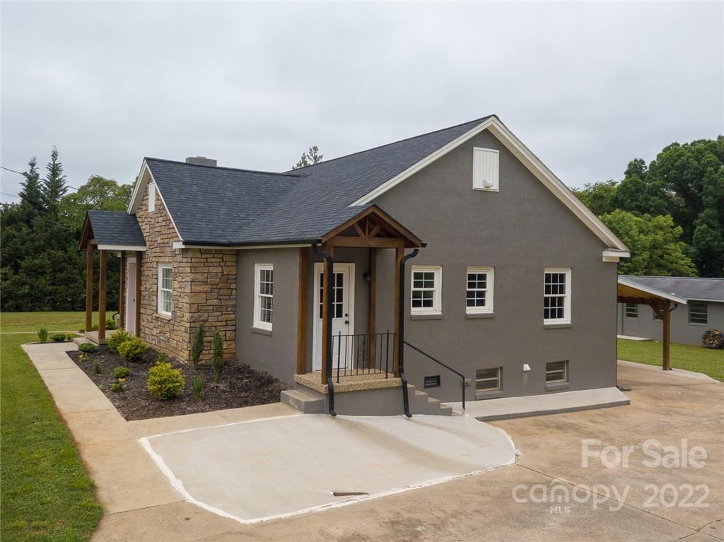 263 McCrary Place Lenoir, NC 28645 - Photo 23 of 40 a view of a house with yard and chairs