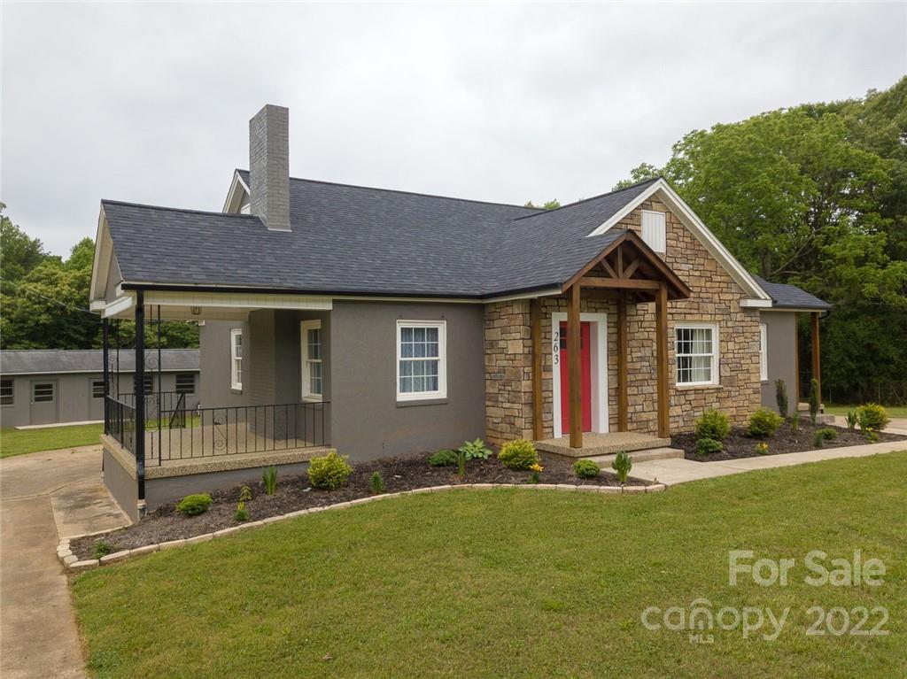 263 McCrary Place Lenoir, NC 28645 - Photo 32 of 40 a front view of a house with a yard