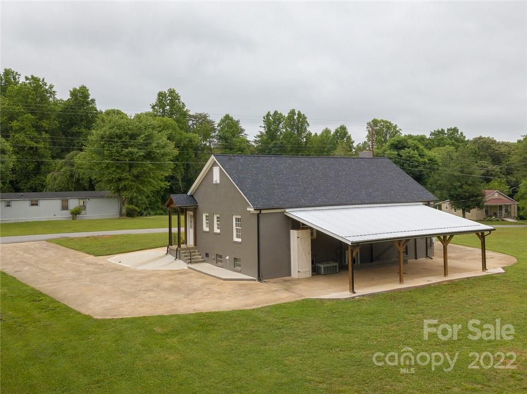 263 McCrary Place Lenoir, NC 28645 - Photo 33 of 40 a view of a house with pool and a yard