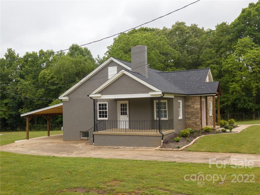 263 McCrary Place Lenoir, NC 28645 - Photo 34 of 40 a view of a house with a yard