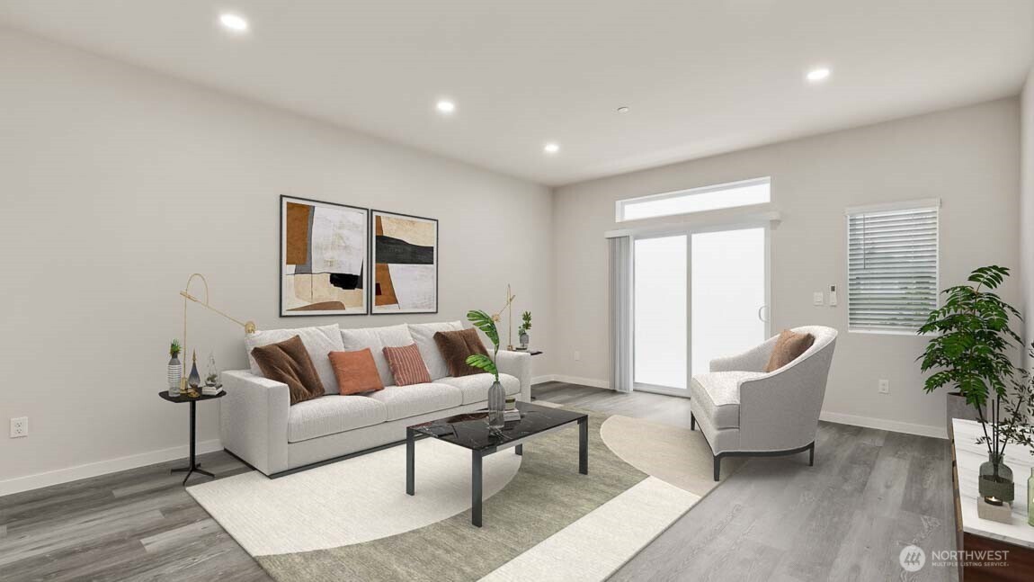 14707 87th Avenue Southeast, Unit DD6 Snohomish, WA 98296 - Photo 3 of 17 a living room with furniture and a potted plant