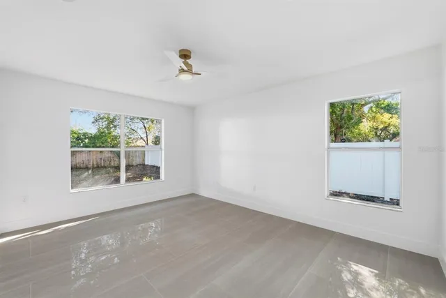a kitchen with a sink and refrigerator