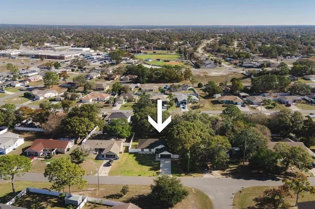 an aerial view of a swimming pool