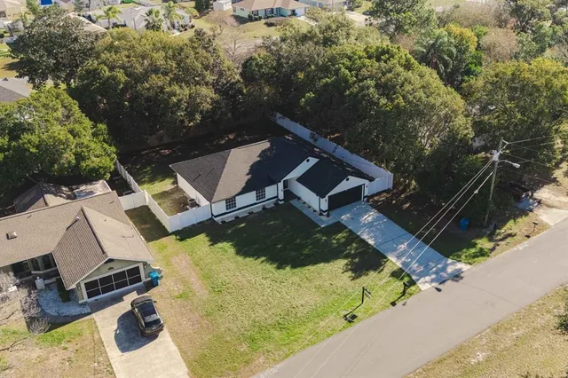 an aerial view of a city with lots of residential buildings