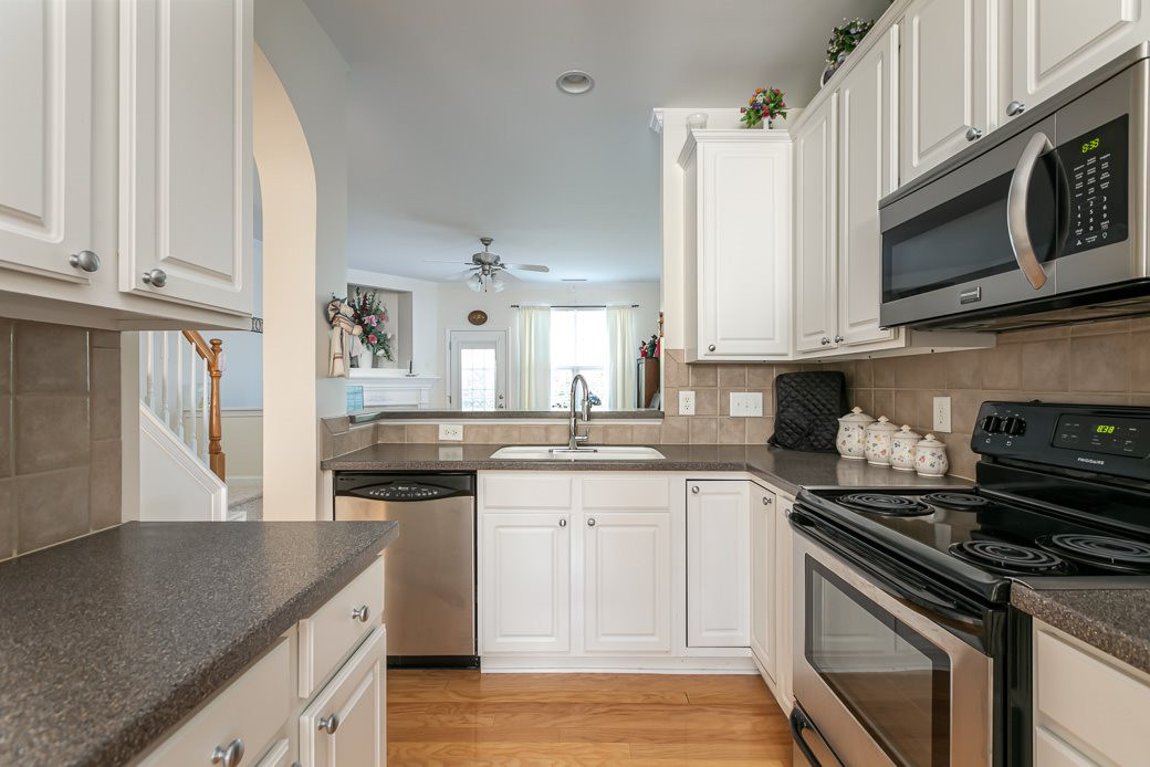 Stainless/black appliances are 3 years old. Kitchen
