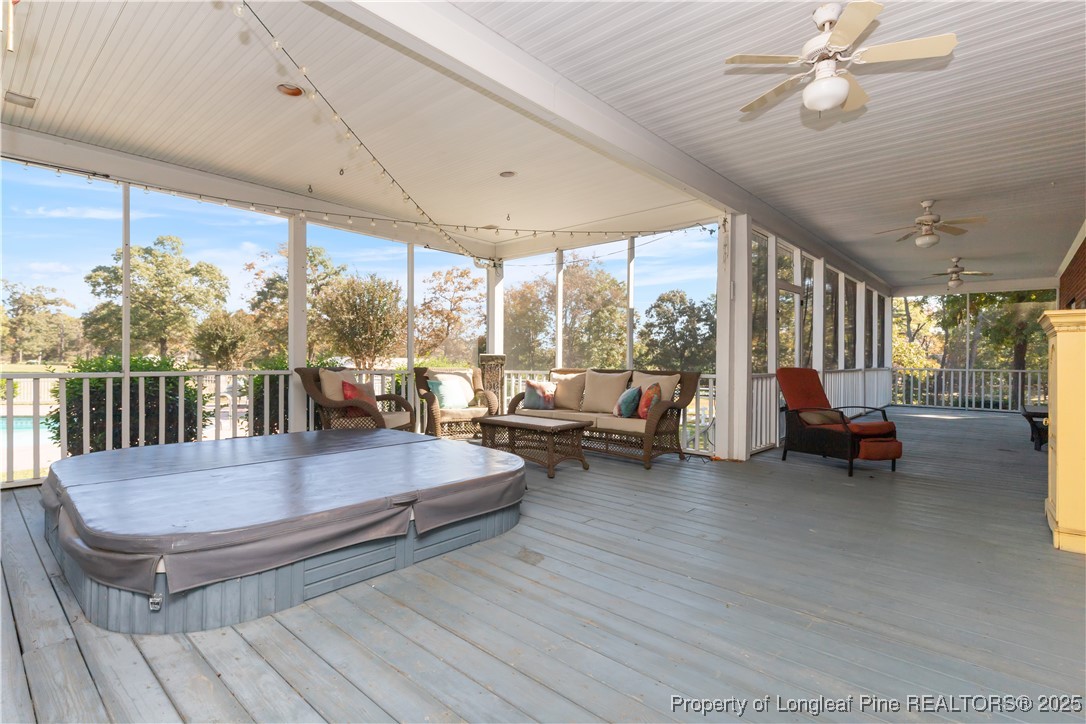 387 3 Bridge Road Dunn, NC 28334 - Photo 48 of 49 a living room with furniture and a large window