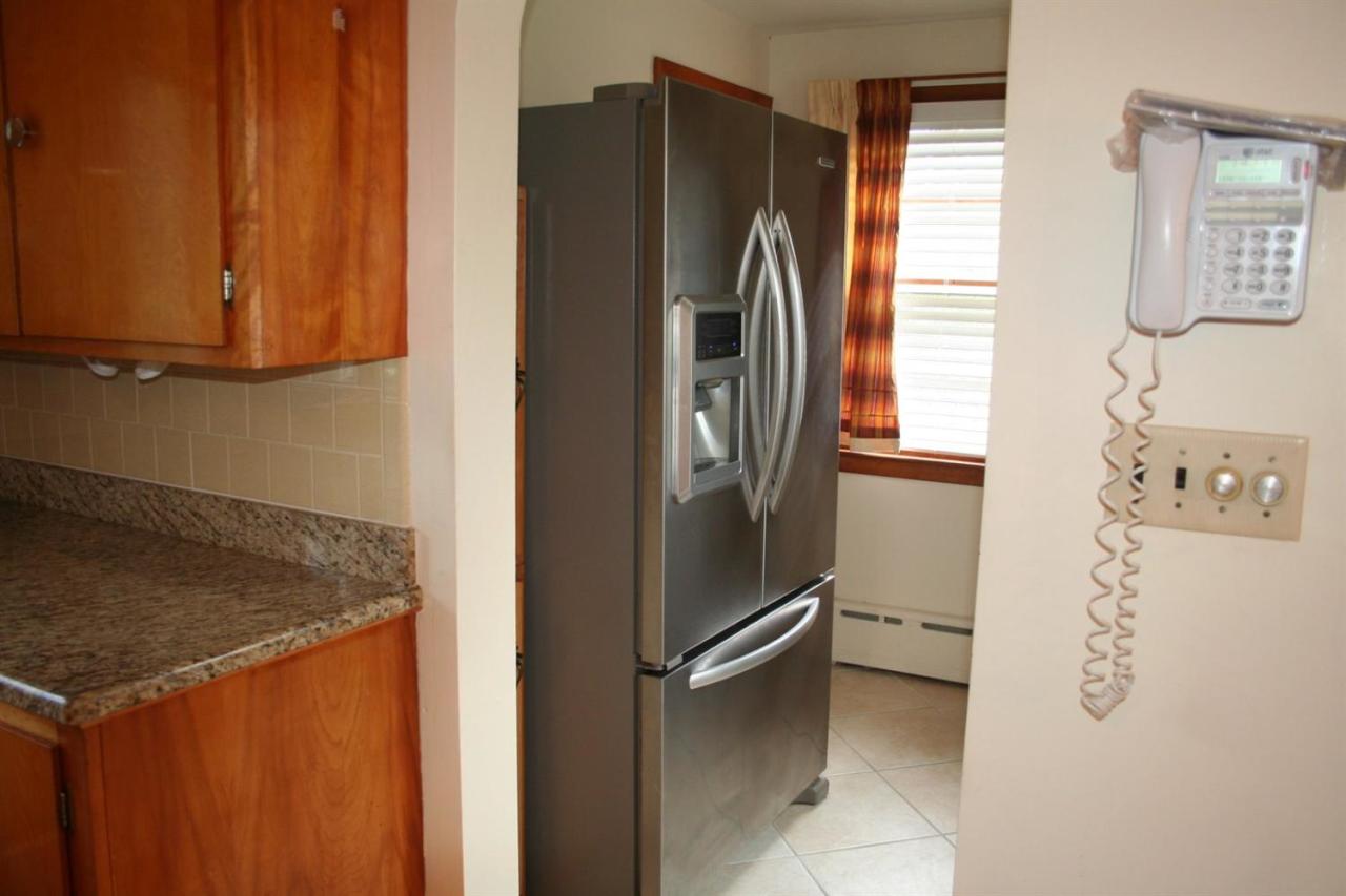 1225 County Road Cataumet, MA 02534 - Photo 8 of 24 a kitchen with refrigerator and window