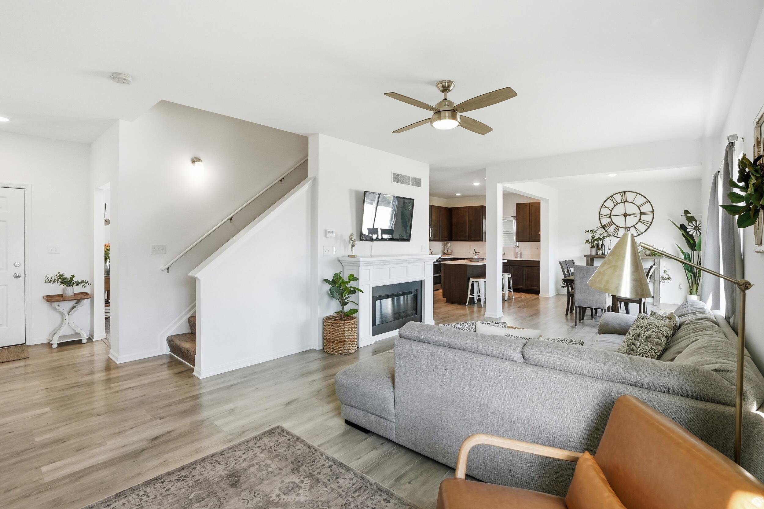 8658 Valley Forge Way Lowell, IN 46356 - Photo 6 of 23 a living room with furniture and a wooden floor
