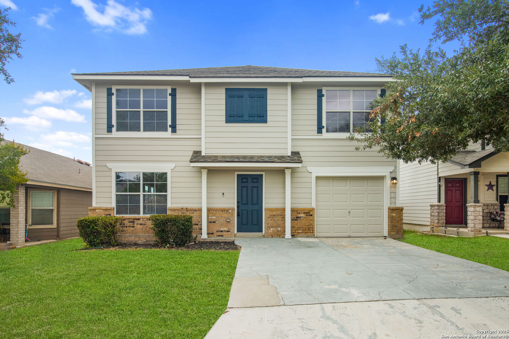 5015 Badland Beacon Converse, TX 78109 - Photo 1 of 23 a front view of a house with a garden