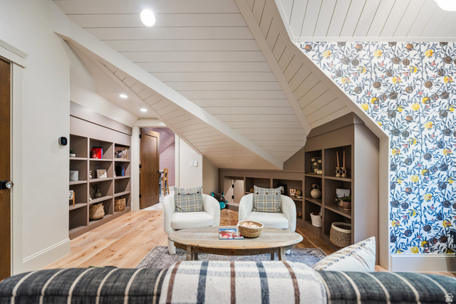 1141 South Oak Leaf Lane Springville, UT 84663 - Photo 84 of 147 Accent wall with botanical pattern wallpaper, wood-finish flooring, built-in shelving, paneled ceiling, and recessed lighting