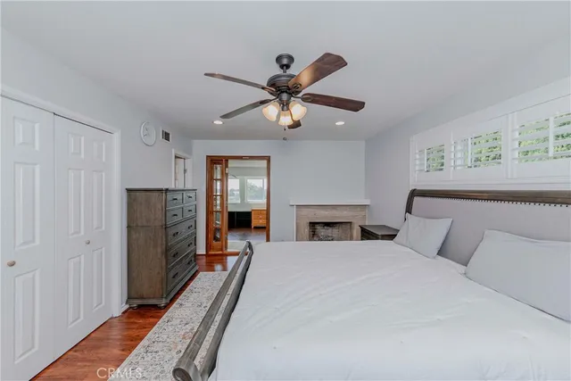 a bed room with furniture and a fireplace