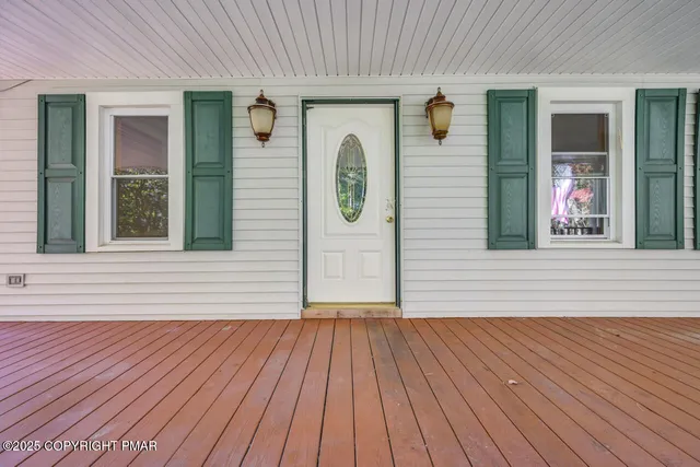 a bathroom with a sink a tub and a mirror