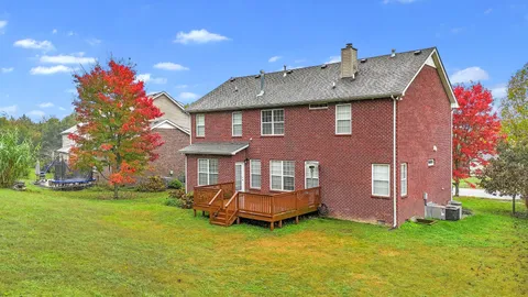 a front view of house with yard