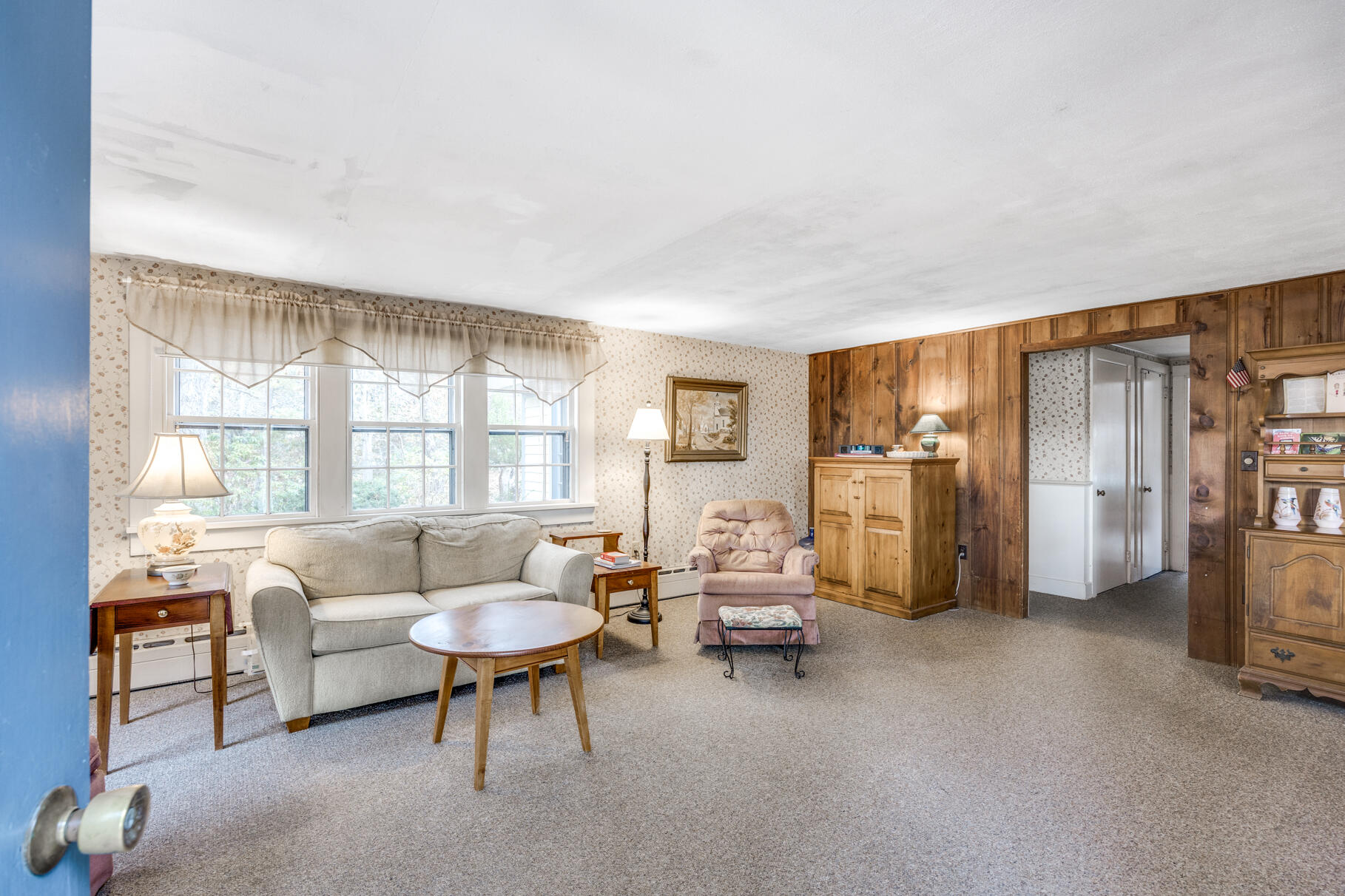 25 1st Avenue Wellfleet, MA 02667 - Photo 11 of 56 a living room with furniture and a window