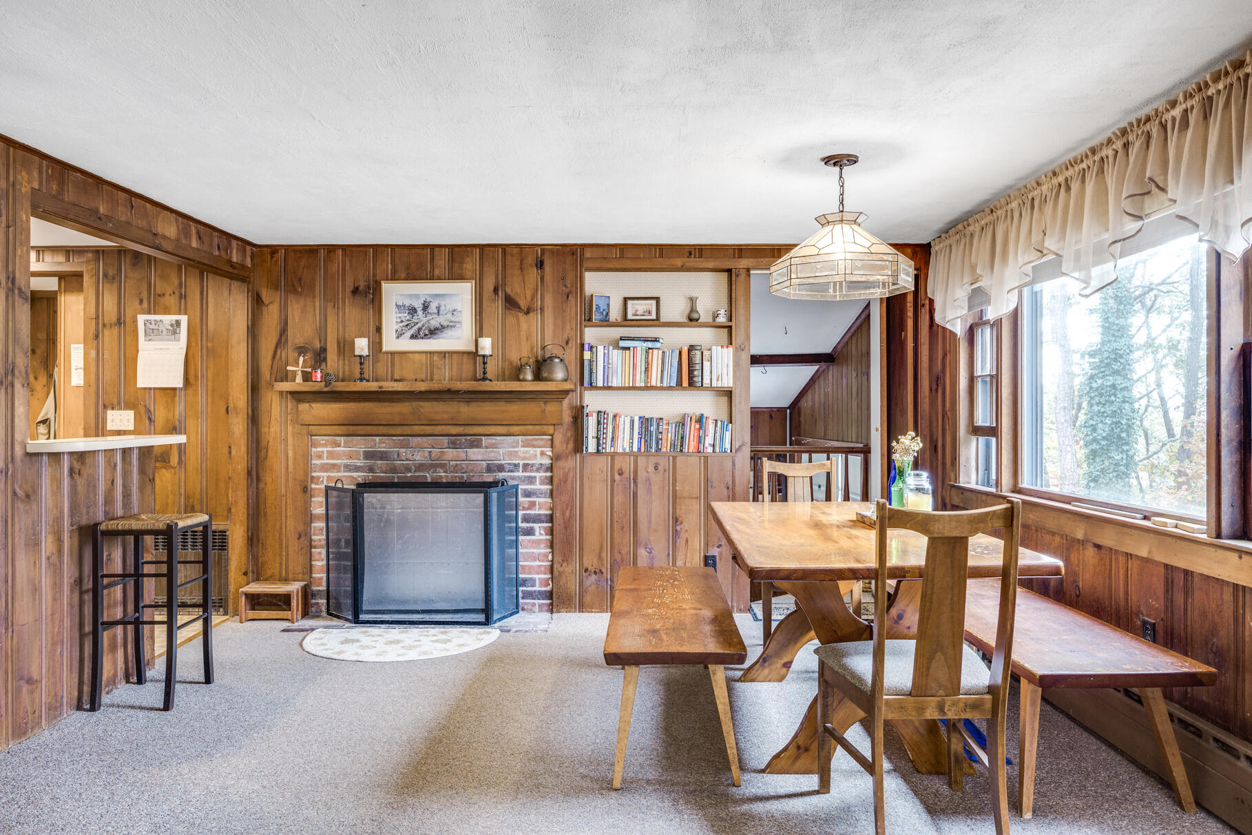 25 1st Avenue Wellfleet, MA 02667 - Photo 12 of 56 a view of a livingroom with furniture and a fireplace