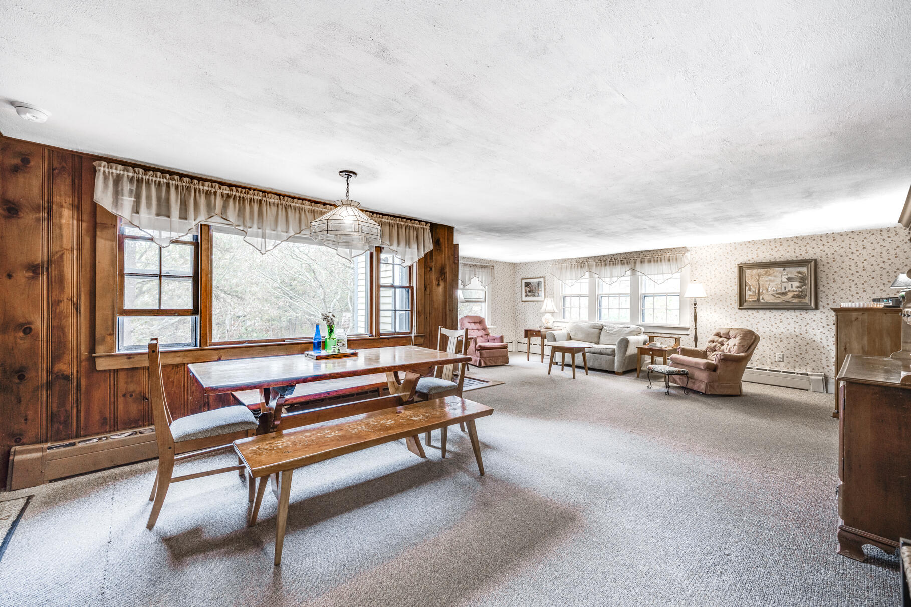 25 1st Avenue Wellfleet, MA 02667 - Photo 16 of 56 a living room with furniture and a flat screen tv