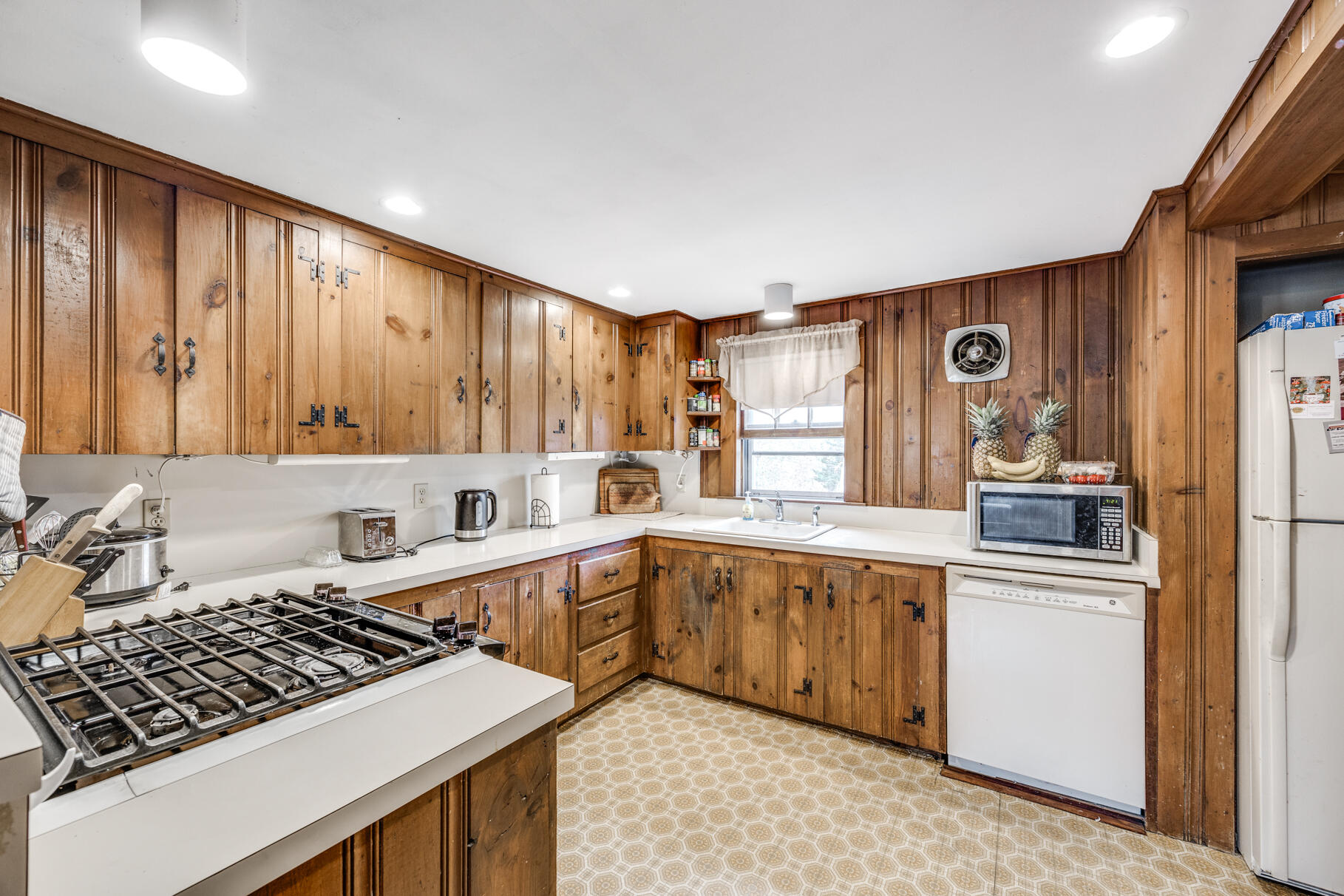 25 1st Avenue Wellfleet, MA 02667 - Photo 17 of 56 a kitchen with stainless steel appliances granite countertop a stove and a sink
