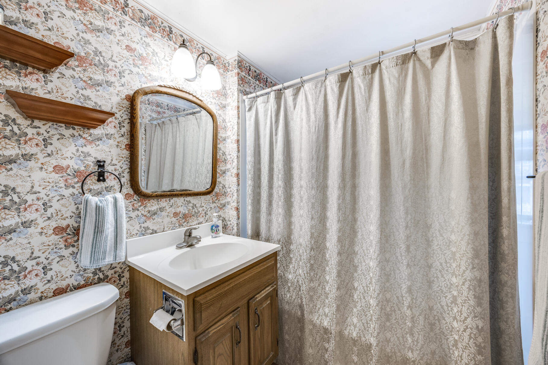 25 1st Avenue Wellfleet, MA 02667 - Photo 23 of 56 a bathroom with a sink and a mirror