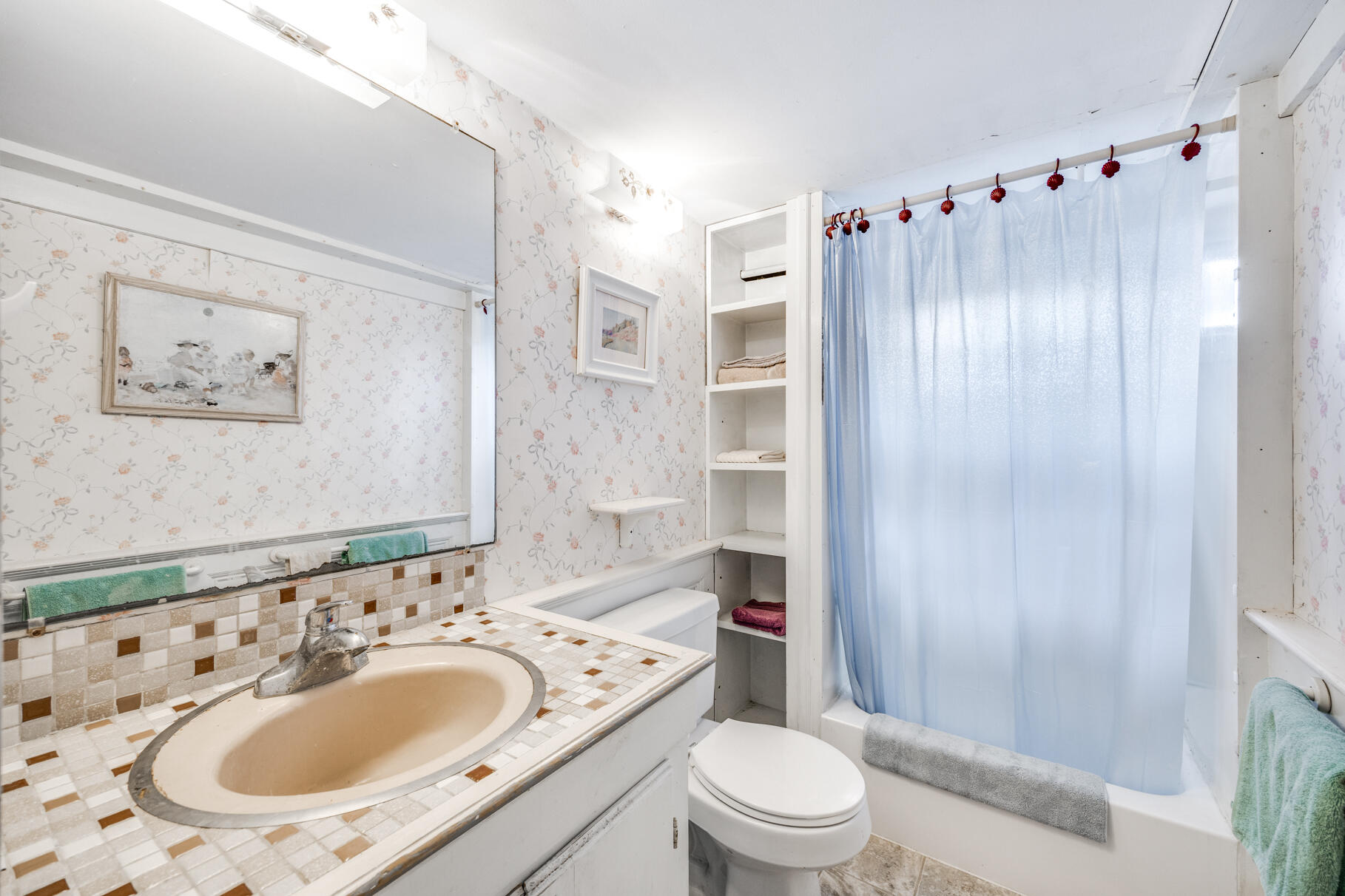 25 1st Avenue Wellfleet, MA 02667 - Photo 31 of 56 a bathroom with a sink toilet and shower