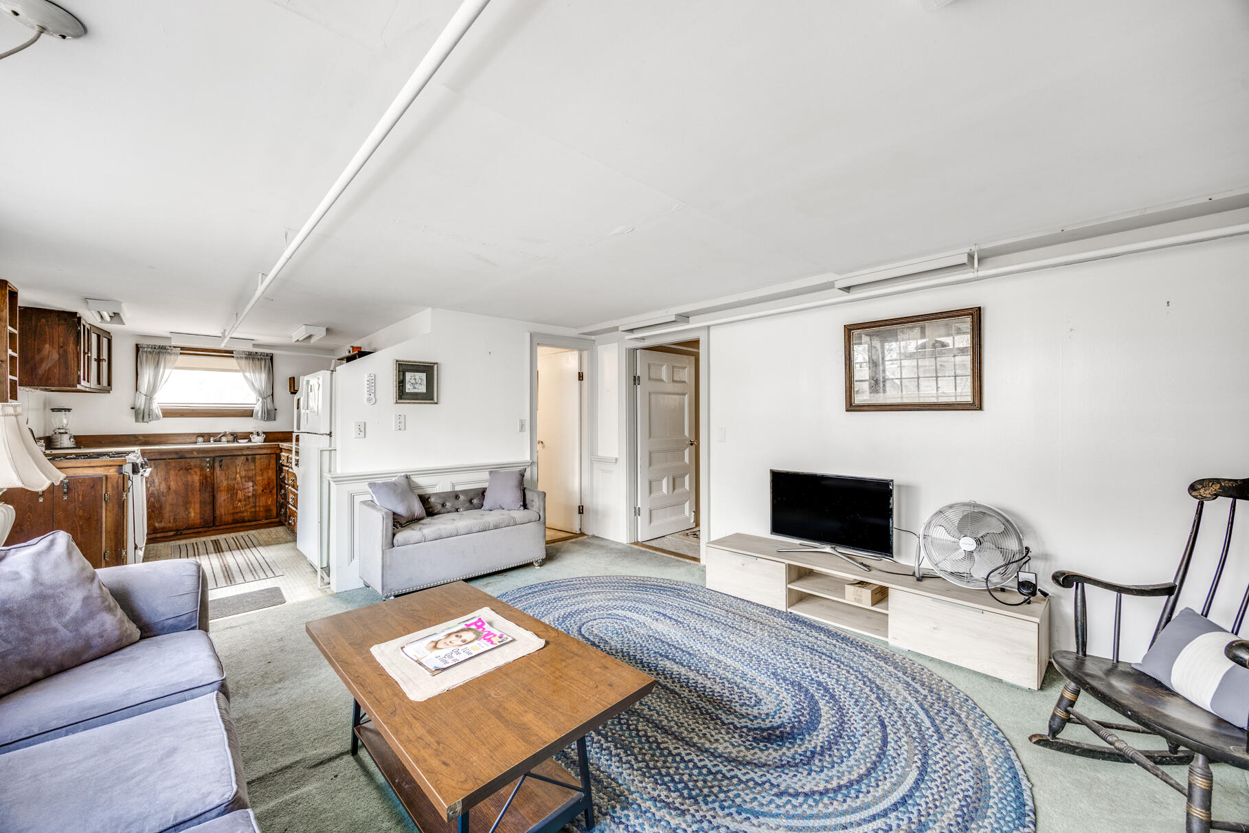 25 1st Avenue Wellfleet, MA 02667 - Photo 34 of 56 a living room with furniture and a flat screen tv