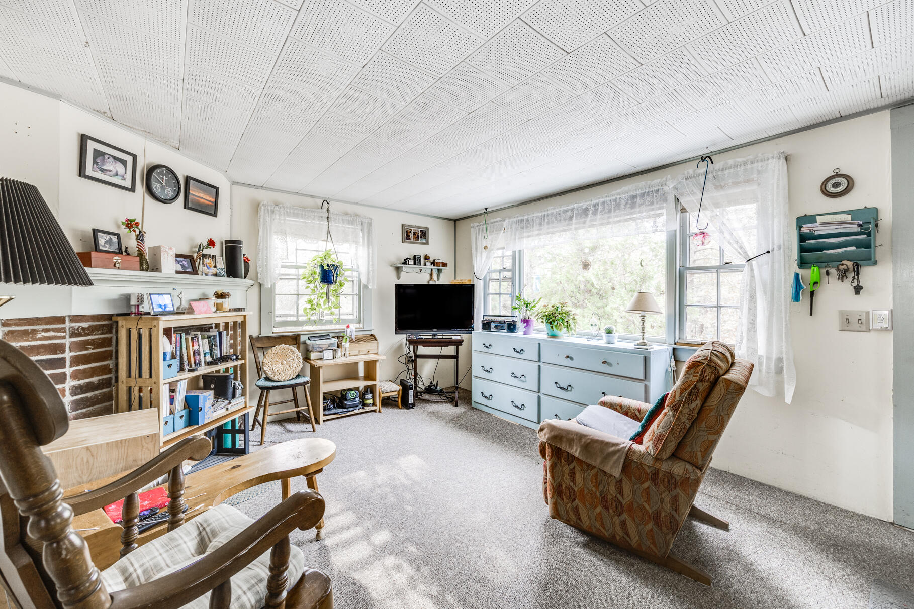 25 1st Avenue Wellfleet, MA 02667 - Photo 36 of 56 a living room with furniture and a flat screen tv