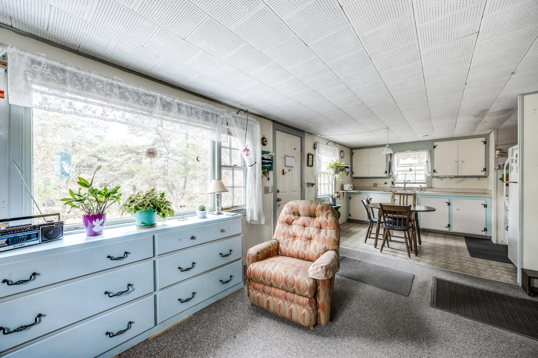 25 1st Avenue Wellfleet, MA 02667 - Photo 37 of 56 a living room with furniture and a large window