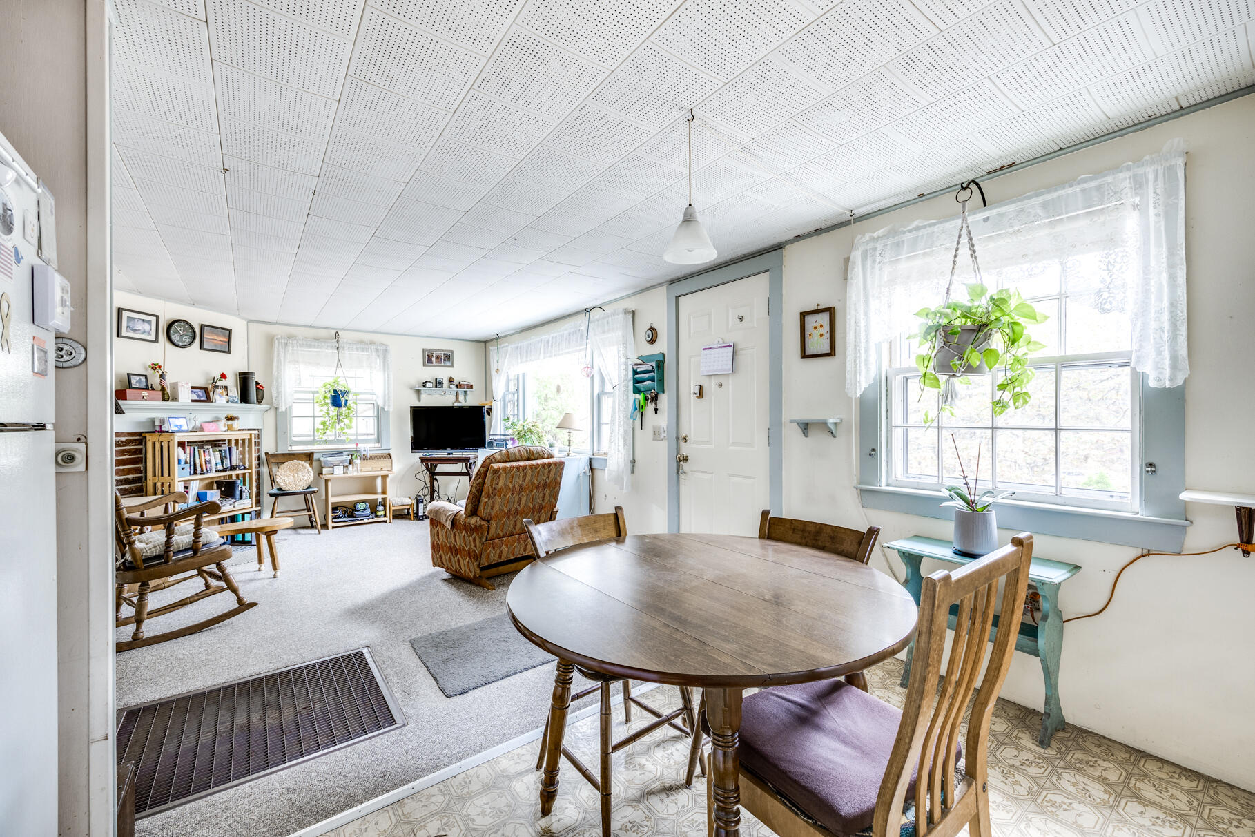 25 1st Avenue Wellfleet, MA 02667 - Photo 39 of 56 a living room with furniture and a large window