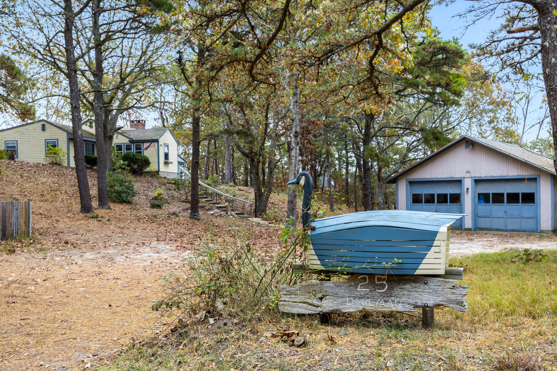 25 1st Avenue Wellfleet, MA 02667 - Photo 4 of 56 a front view of a house with garden