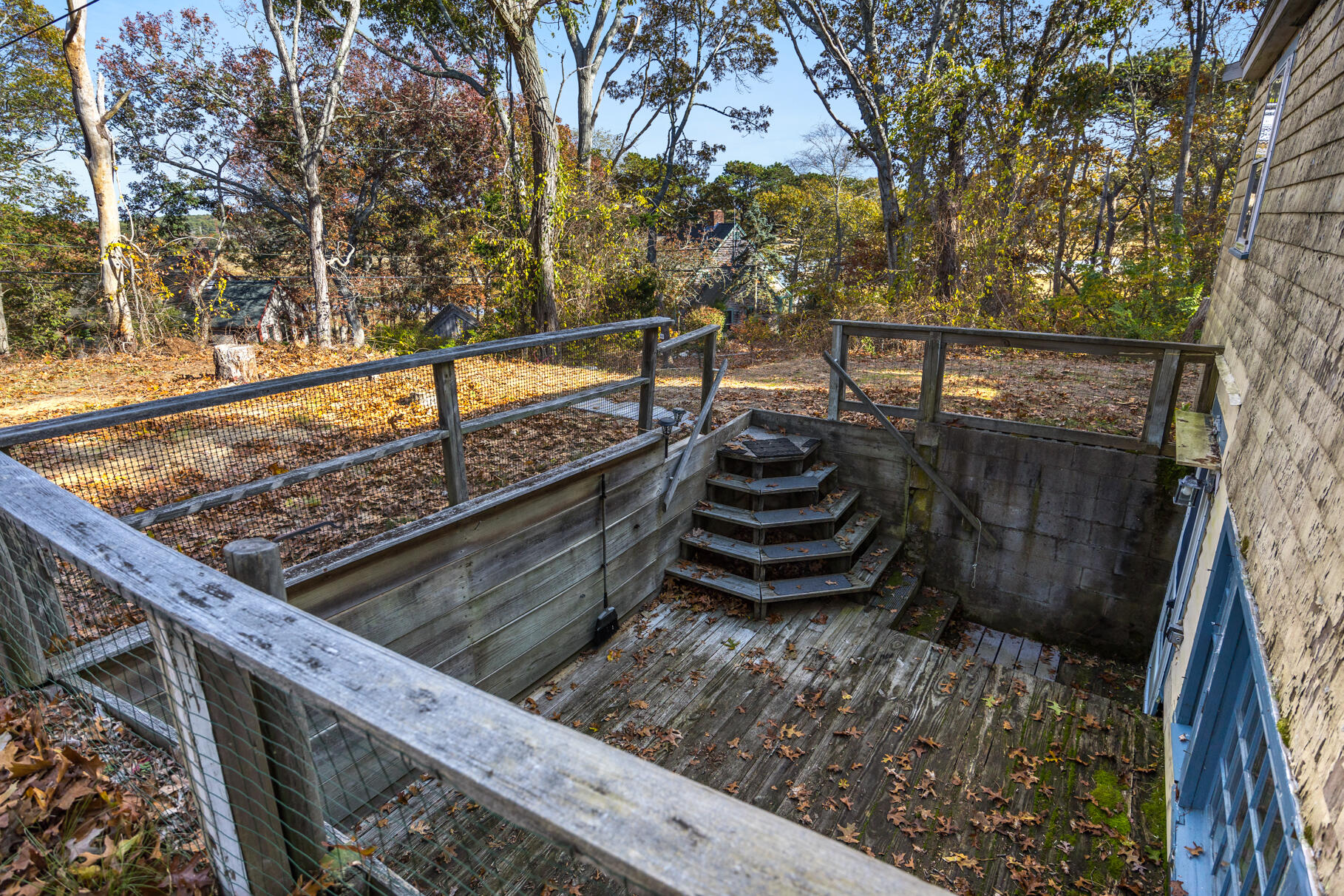 25 1st Avenue Wellfleet, MA 02667 - Photo 44 of 56 a view of a wooden deck with trees