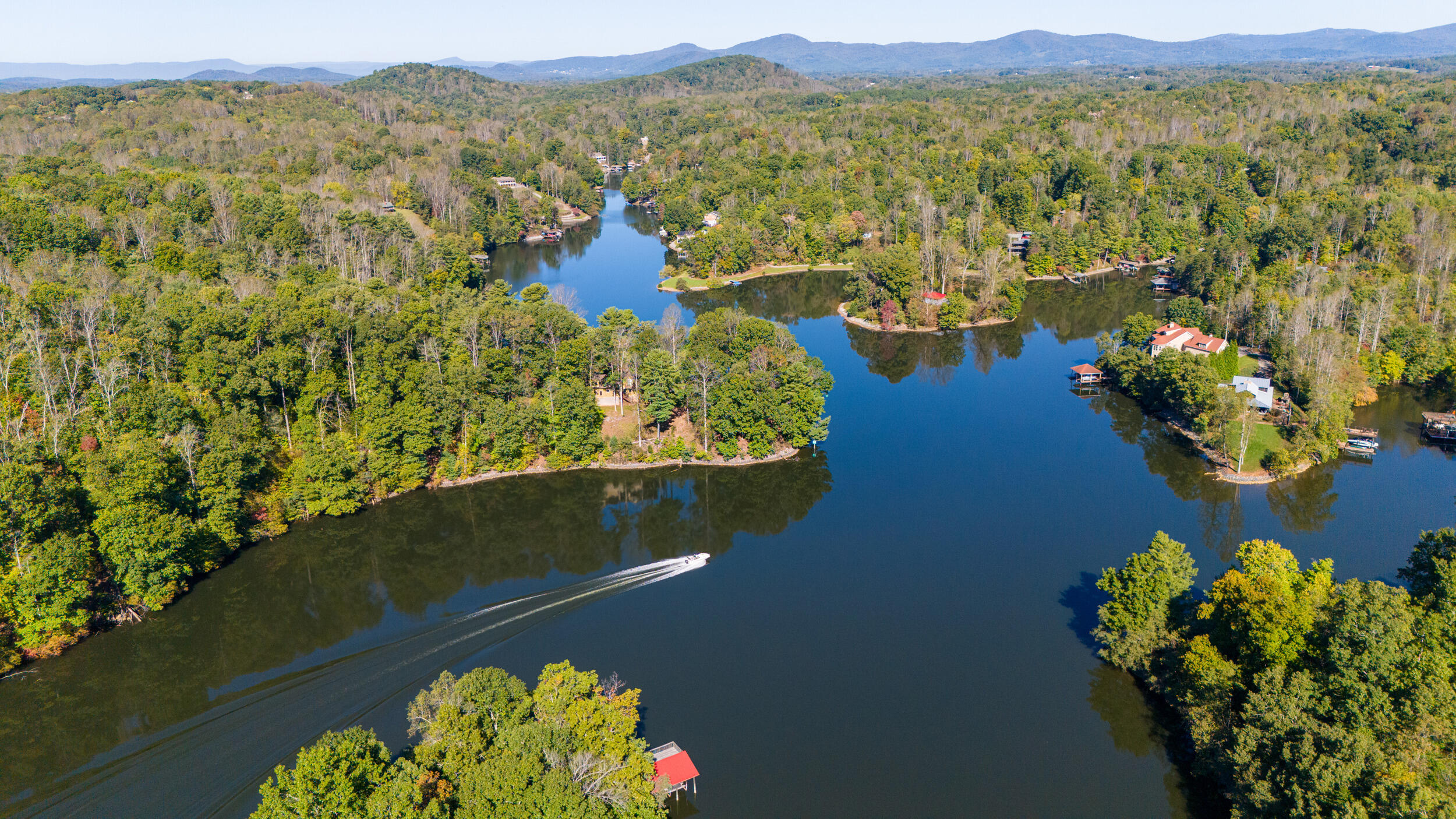 1778 Carroll Road Goodview, VA 24095 - Photo 27 of 97 a view of a lake with a mountain view