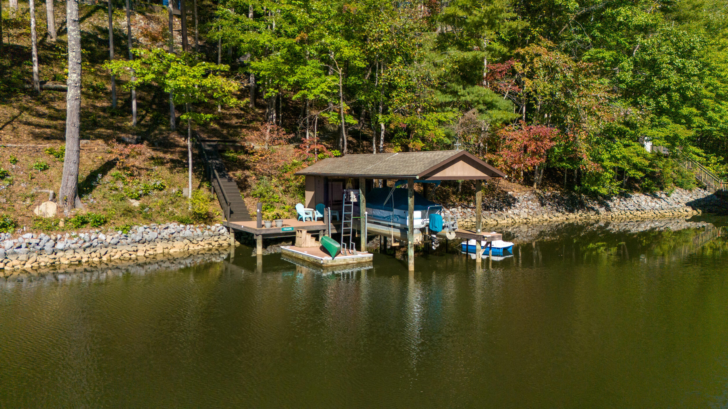 1778 Carroll Road Goodview, VA 24095 - Photo 29 of 97 a view of swimming pool with outdoor seating and lake view