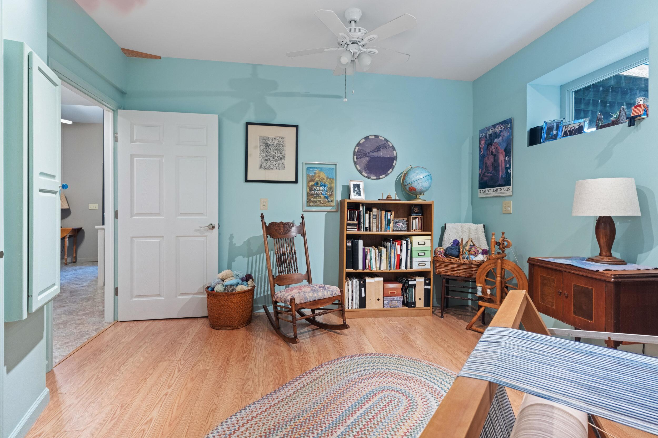 1778 Carroll Road Goodview, VA 24095 - Photo 72 of 97 a living room with furniture and a book shelf