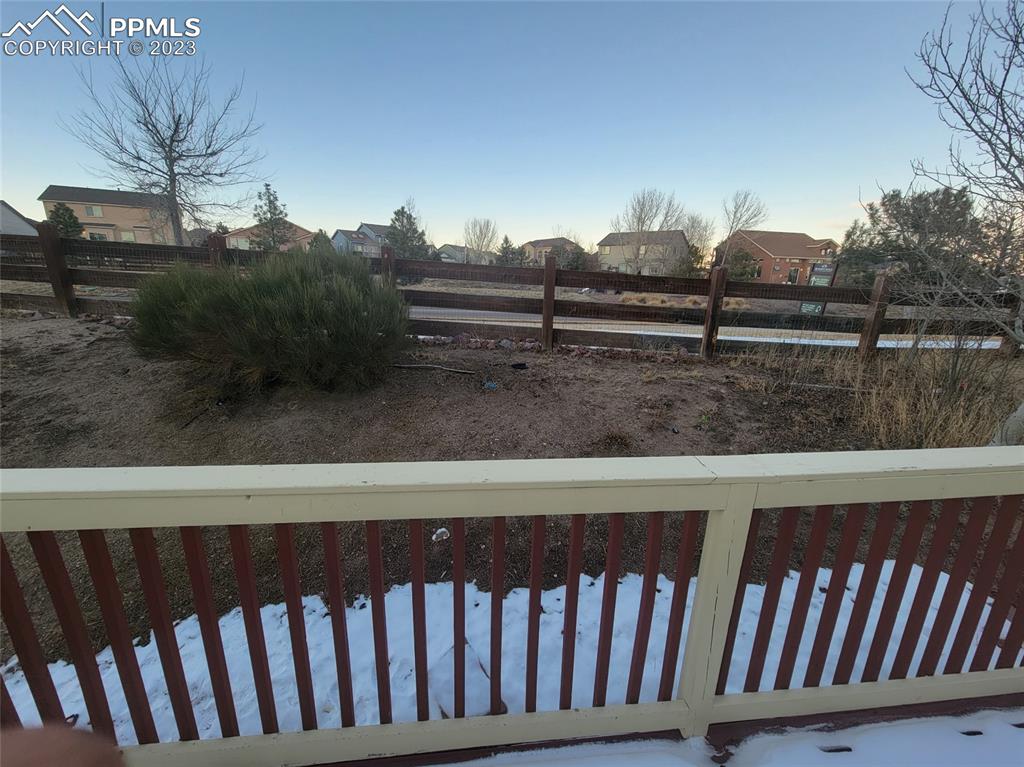 12264 Point Reyes Drive Peyton, CO 80831 - Photo 19 of 24 a view of a wooden fence