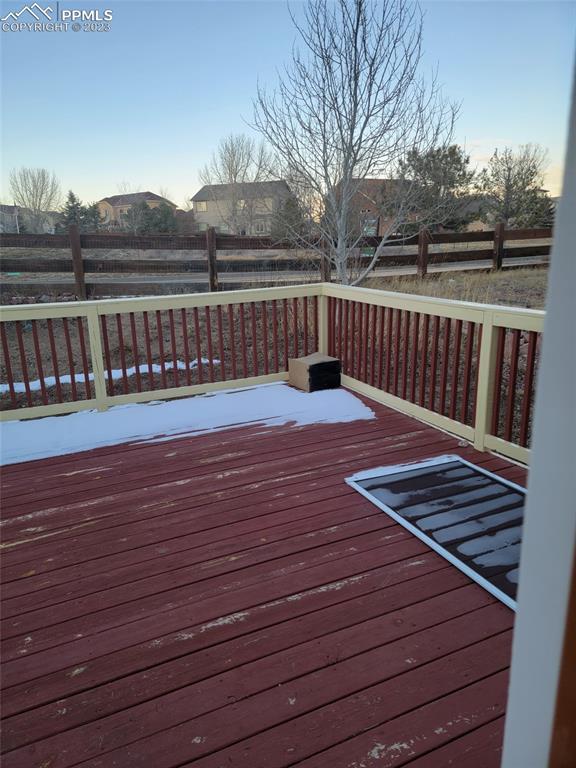 12264 Point Reyes Drive Peyton, CO 80831 - Photo 20 of 24 a terrace view with wooden floor and city view