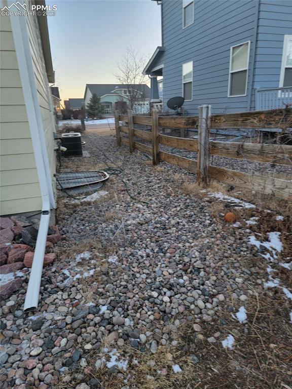 12264 Point Reyes Drive Peyton, CO 80831 - Photo 24 of 24 a view of a backyard with sitting area