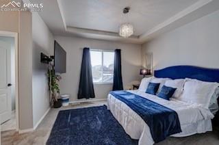 12264 Point Reyes Drive Peyton, CO 80831 - Photo 7 of 24 a bedroom with bed and a large window