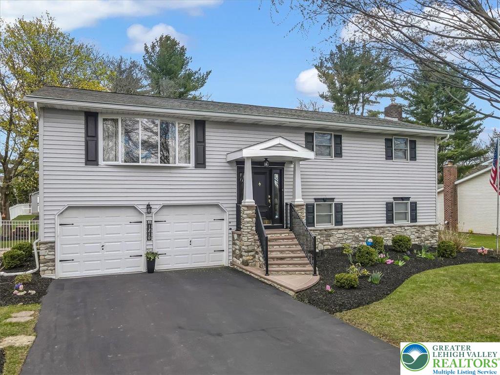 1210 Bluestone Drive Bethlehem, PA 18017 - Photo 2 of 84 front view of a house with a yard