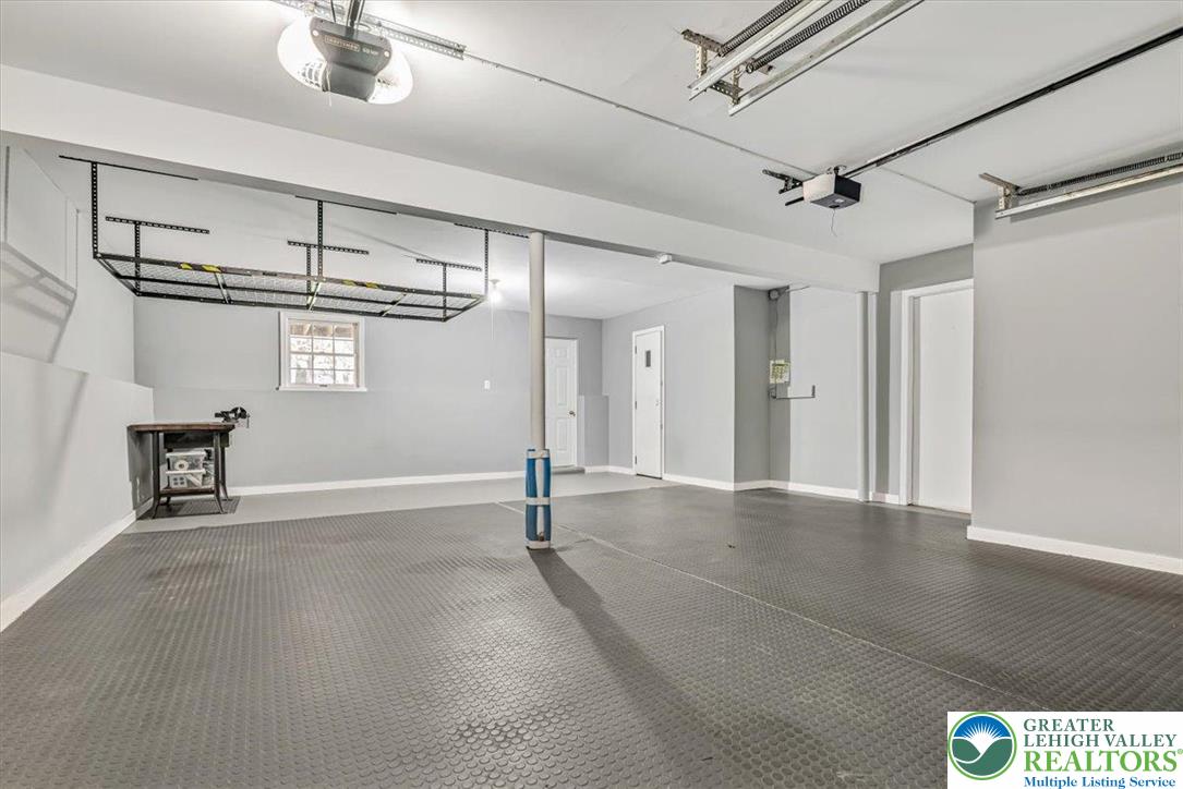 1210 Bluestone Drive Bethlehem, PA 18017 - Photo 58 of 84 a view of an empty room with a chandelier