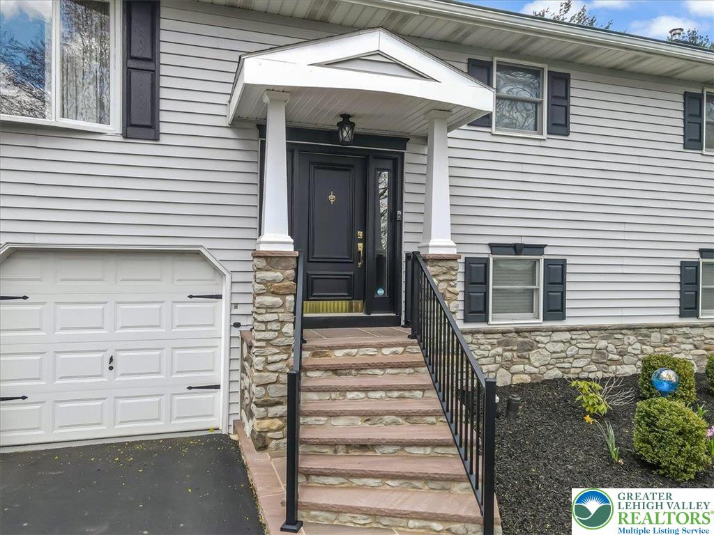 1210 Bluestone Drive Bethlehem, PA 18017 - Photo 7 of 84 a front view of a house with a window