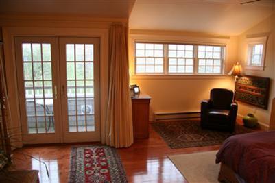 7 Miller Hill Road Provincetown, MA 02657 - Photo 19 of 30 a bedroom with furniture and a window