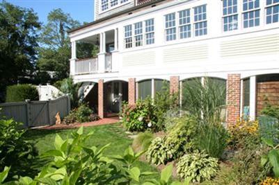 7 Miller Hill Road Provincetown, MA 02657 - Photo 2 of 30 front view of a house with a yard