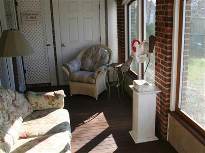 7 Miller Hill Road Provincetown, MA 02657 - Photo 22 of 30 a living room with furniture and a window