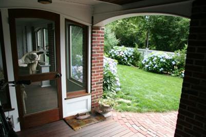 7 Miller Hill Road Provincetown, MA 02657 - Photo 23 of 30 a view of a porch with furniture and garden