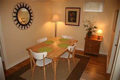 7 Miller Hill Road Provincetown, MA 02657 - Photo 26 of 30 a view of a dining room with furniture and wooden floor