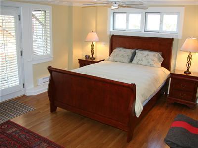 7 Miller Hill Road Provincetown, MA 02657 - Photo 27 of 30 a bedroom with a bed and window