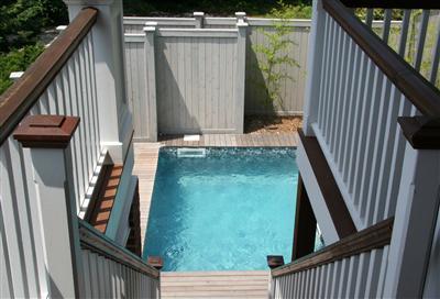 7 Miller Hill Road Provincetown, MA 02657 - Photo 6 of 30 a view of balcony with wooden floor and fence