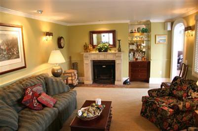 7 Miller Hill Road Provincetown, MA 02657 - Photo 8 of 30 a living room with furniture and a fireplace