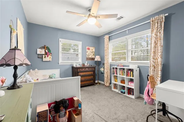 a room with furniture and a window