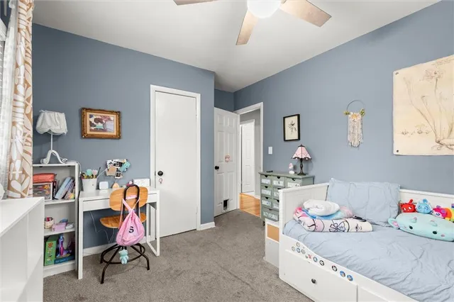 a bedroom with furniture and a bed