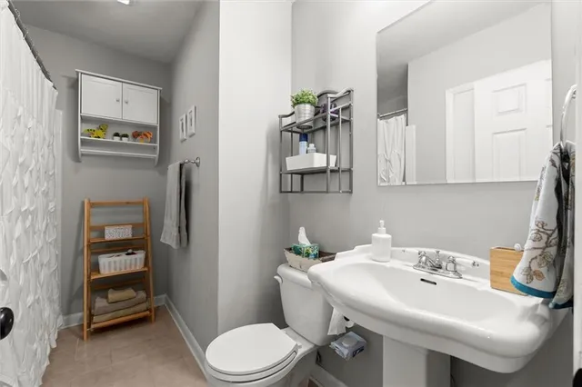 a view of a patio with a table and chairs